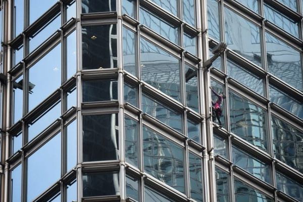 'French Spiderman' Scales Hong Kong Skyscraper With 'Peace Banner' News Image