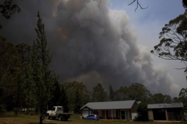 Australian PM apologizes for family vacation amid wildfires Australian PM apologizes for family vacation amid wildfires