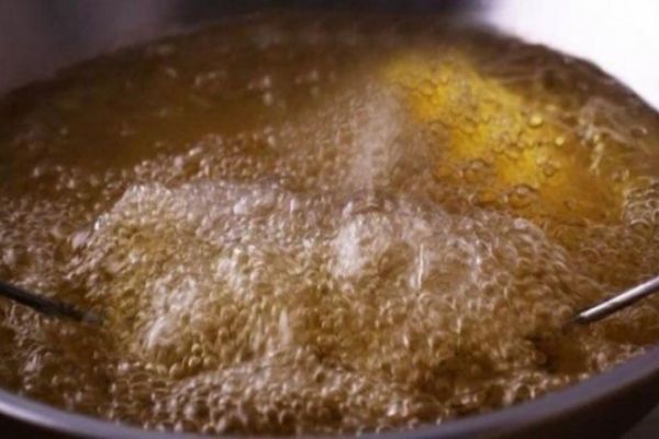 Bengaluru woman thinks husband is cheating on her, throws boiling oil on him Bengaluru woman thinks husband is cheating on her, throws boiling oil on him