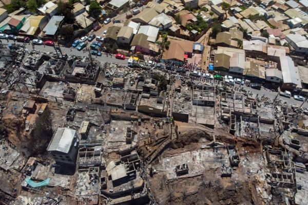 Families Homeless On Christmas After Forest Fire In Chilean Port Families Homeless On Christmas After Forest Fire In Chilean Port