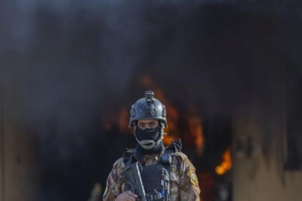 Militiamen withdraw from US Embassy but Iraq tensions linger Militiamen withdraw from US Embassy but Iraq tensions linger