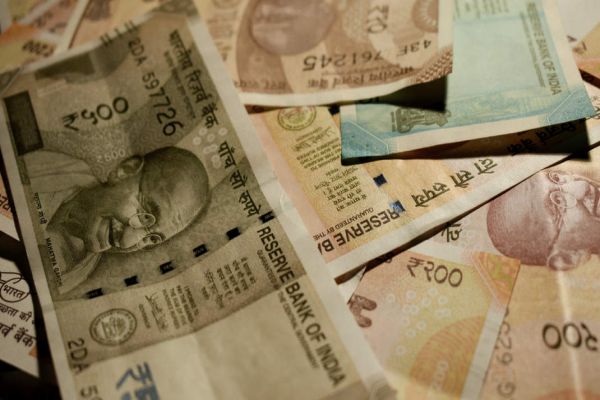 Rupee opens 10 paise up at 71.24 against dollar Rupee opens 10 paise up at 71.24 against dollar
