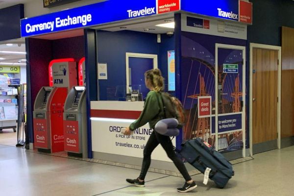 Travelex staff put away pens and paper as UK systems come back online Travelex staff put away pens and paper as UK systems come back online