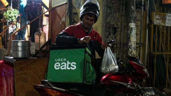 Uber sells its India food delivery business to Zomato News Image