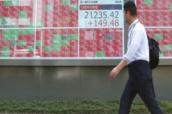 UPDATE 3-Japan downgrades Q2 GDP as trade war hits business investment News Image